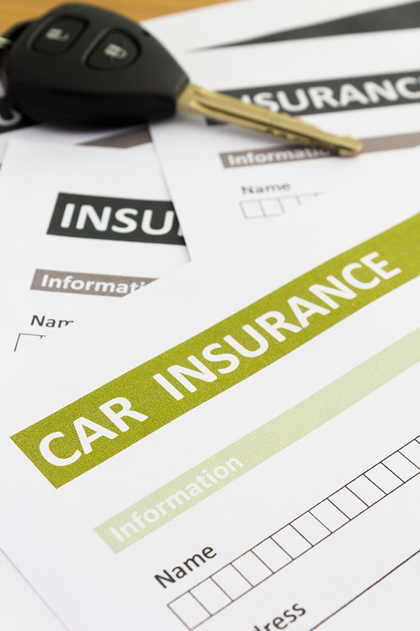 Car insurance form with car key | Metro East, IL