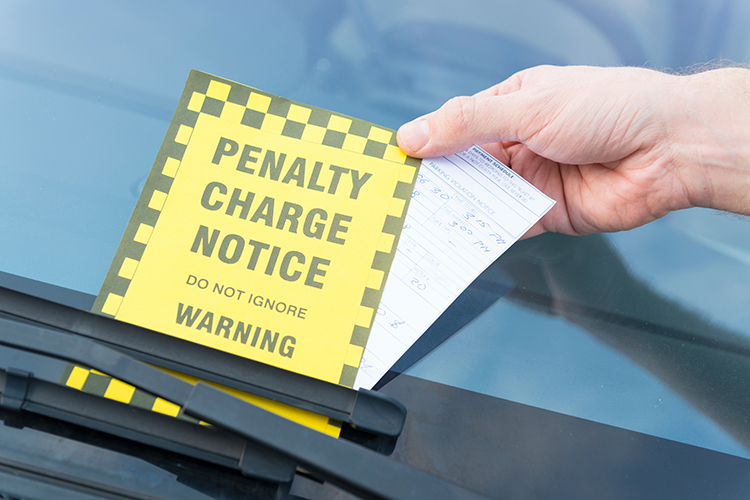 Parking ticket placed under windshield wiper | Metro East, IL